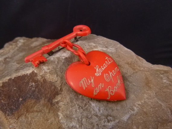 1950s Be My Valentine Red Heart Brooch | Mid Century Thermoset Vintage Plastic Heart Dangling from Key | Message of Love | Book Piece