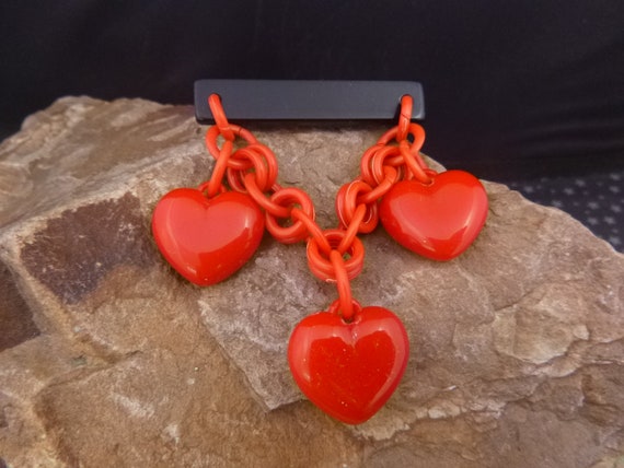 Three Red Hearts Dangling from Black Bar Vintage Valentine Brooch | Retro Last Century Look | Red Plastic Red Heart Pin