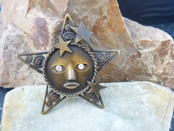 Star Face Brooch Celestial Themed Antiqued Brass Vintage Signed JJ Large Star Pin with Rhinestone Eyes