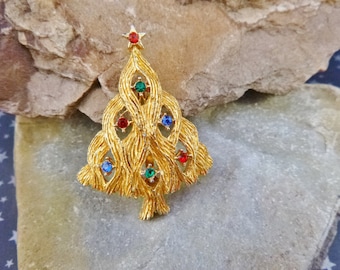 Vintage JJ Christmas Tree Brooch: Gold Tone Wavy Branch Pin with Rhinestones
