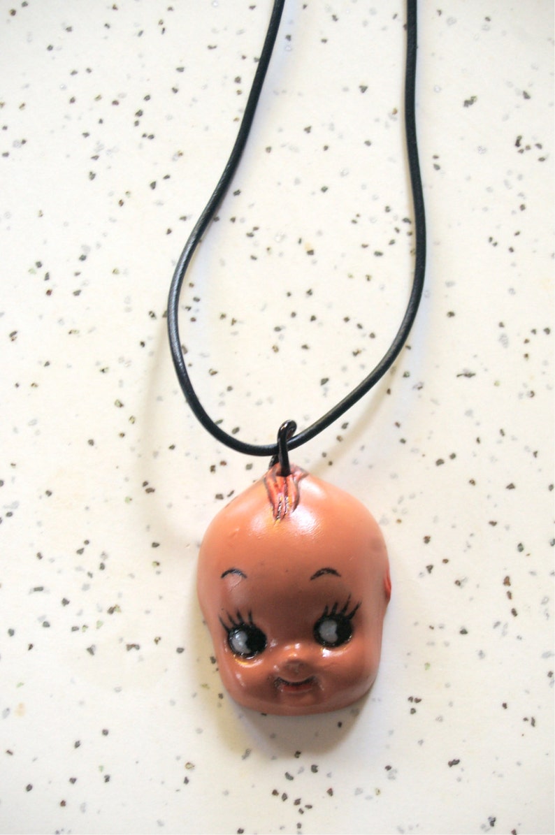 Kewpie Dolll head necklace, small, christening, Edwardian, vintage, Victorian, cupid, retro, resin, handmade, nostalgic, flesh coloured.