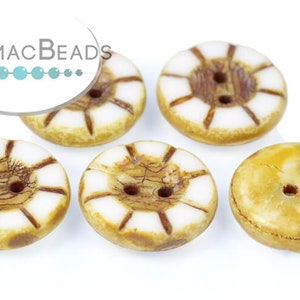 May include: Five brown and white buttons with two holes each. The buttons have a white rim and a brown center with a wood grain pattern.