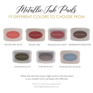 May include: Nineteen different colors of Archival Brilliance pigment ink pads. The ink pads are arranged in rows with the color name below each pad. The colors include Rocket Red Gold, Rocket Red, Pearlescent Poppy, Pearlescent Chocolate, Lightning Black, Starlite Black, and Pearlescent Ice Blue.