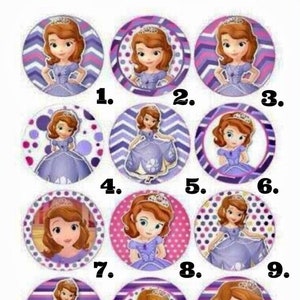 May include: Fifteen round purple, pink and white stickers featuring a cartoon image of a young girl with brown hair wearing a purple dress and a crown. The stickers are numbered 1 to 15.