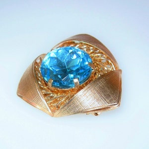 Stunning Vintage West Germany Gold Tone & Blue Rhinestone Brooch Large Prong Set Faceted Center Stone