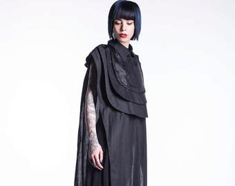 ブラック マキシ トップ、アバンギャルドな服、ゆったりとしたフィットのブラック ノースリーブ チュニック トップ、贅沢なチュニック