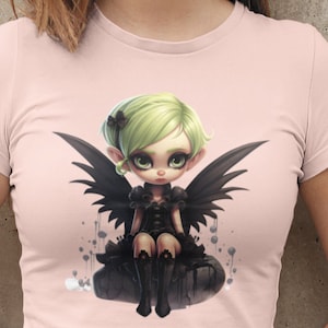 May include: A pink t-shirt with a graphic of a dark fairy with green hair and black wings sitting on a rock.
