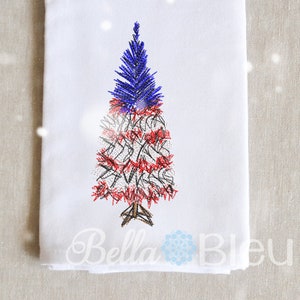 May include: A white kitchen towel with an embroidered image of a blue and red Christmas tree. The tree is decorated with red and white stripes, resembling the American flag.