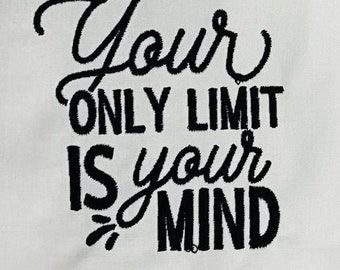 May include: Black embroidered text on a white background that reads "Your only limit is your mind."