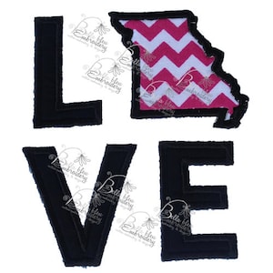 May include: Black and white applique letters spelling "LOVE" with a pink and white chevron pattern Missouri state outline in the center.