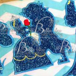 May include: A blue glitter silhouette embroidery design of Belle and the Beast from Beauty and the Beast.