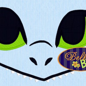 May include: A blue cartoon dragon face with black eyes and green pupils. The dragon has a wide open mouth with white teeth.