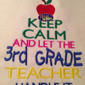 May include: Embroidered design on a white fabric background. The design says "Keep Calm and Let the 3rd Grade Teacher Handle It". A red apple with a green leaf is above the text.