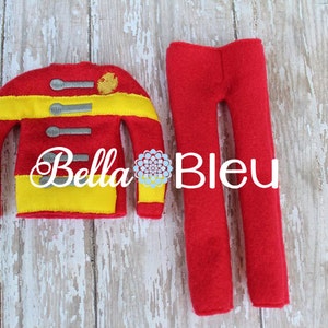 May include: Red and yellow elf-sized firefighter costume with a jacket and pants. The jacket has silver buttons and a yellow trim. The pants are solid red.