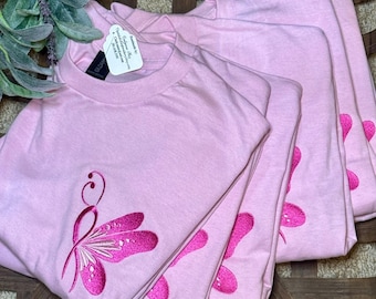 in OCTOBER We Wear PINK shirt, embroidered butterfly breast cancer ribbon