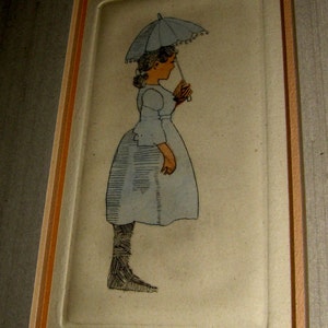 May include: A framed print of a girl in a blue dress holding a white umbrella. The print is titled "Pluie" and numbered 48/200.
