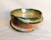 Golden metallic raku spiral ringed "Saturn" decorative bowl