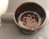 Guide Dog Libby Paw Print Pet Bowl in whirling gradient tones of bronze and green, smooth and round,  18 FlOz- Made by blind ceramic artist