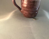 Bohemian, free flowing Coffee Mug in splashes of purple tones with flaring, curvy handle – Made by Blind Ceramic Artist