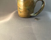 Bohemian Demitasse small mug in rich Mocha with purple, blue, and green whirls, unusual, curvy handle – Made by Blind Ceramic Artist