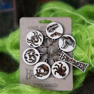 Halloween stitch markers for knitting and crochet. Set of 7 progress keepers made from maple wood. Witch hat, zombie, pumpkin, skull, spider