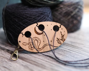 Snake in night sky knitting & crochet yarn separator. Yarn divider with three holes for colorwork, made from cherry wood.