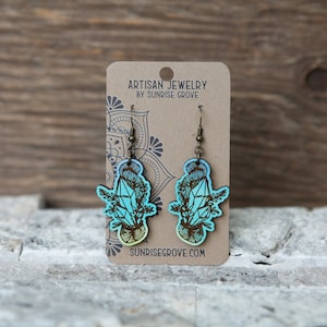Crystals and leaves bound to a yarn hank earrings. Choose from a mix of colors or bare wood look. Great for those into fiber yarns & witchy