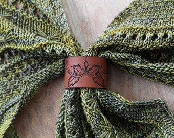 Leaf Scroll Leather Shawl Cuff, made from leather with a bronze stud. Great for holding your knitted and crocheted scarves, shawls and cowls