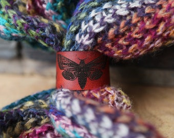 Moth Shawl Cuff, made from leather with a bronze stud. Great for your knitted and crocheted scarves, shawls and cowls. With yarrow plant.