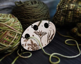 Luna Moth in night sky knitting & crochet yarn separator. Yarn divider with three holes for colorwork, made from maple wood.
