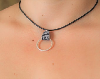 Sterling Silver and Genuine Black and White Patterned Leather Pendant that hangs on Leather Black Cord