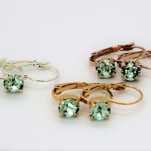 Leverback Earrings made with Chrysolite Green Swarovski Crystal Elements Choose Your finish. Earrings by Lady C Jewellery