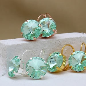 Versatile Chrysolite Green 14mm Preciosa Crystal Lever Back Earrings Perfect for Every Occasion In A Choice Of 3 Finishes