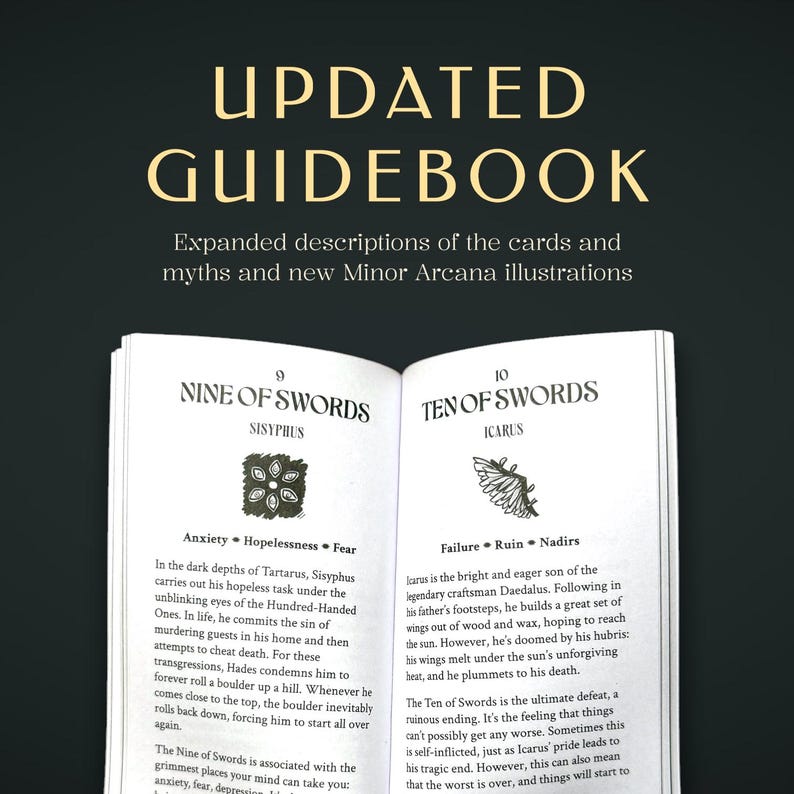 May include: An open guidebook with black text on white pages. The top text reads UPDATED GUIDEBOOK. Expanded descriptions of the cards and myths and new Minor Arcana illustrations. The pages show Nine of Swords Sisyphus and Ten of Swords Icarus.