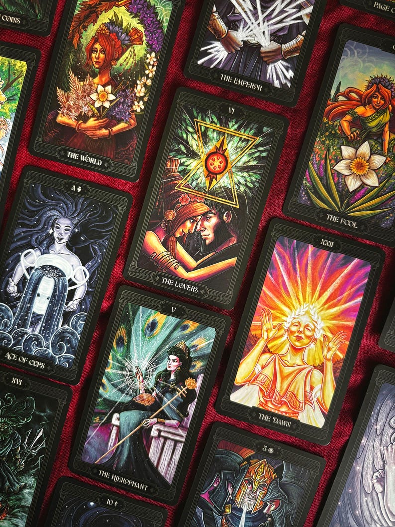 Greek mythology inspired tarot card spread with The Lovers, The World, The Hierophant, Ace of Cups, and others. Part of the Asphodelon Greek mythology tarot deck.
