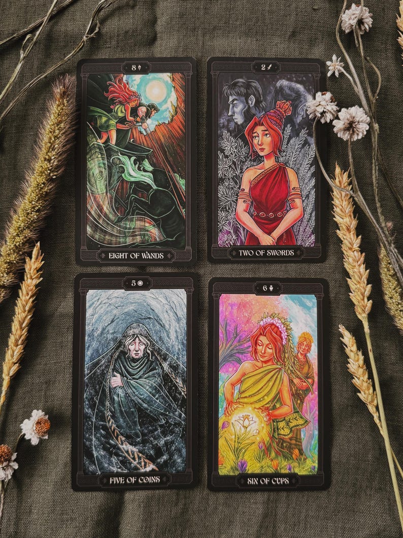 May include: Four tarot cards arranged in a grid. The top left card is Eight of Wands, top right is Two of Swords, bottom left is Five of Coins, and bottom right is Six of Cups. Each card features detailed, colourful illustrations and black borders.
