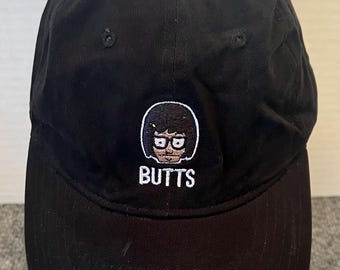 Bob’s Burgers Hat Cap Strap Back Tina Butts Embroidered Black Cotton Adjustable
