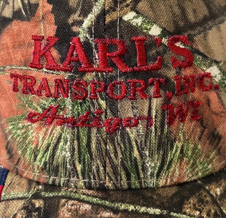 Antigo Wisconsin Hat NWT “Karl’s Transport” Mossy Oak Camo Flag image 2