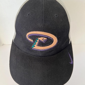 May include: Black baseball cap with a gray mesh back. The cap features the Arizona Diamondbacks logo in purple, teal, and tan. A purple Nike swoosh is on the side.