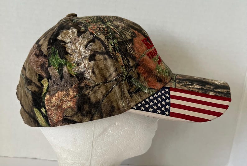Antigo Wisconsin Hat NWT “Karl’s Transport” Mossy Oak Camo Flag image 5