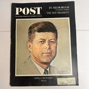 May include: A vintage December 14, 1963 issue of The Saturday Evening Post magazine featuring a portrait of John F. Kennedy by Norman Rockwell. The cover includes the text POST, IN MEMORIAM, A senseless tragedy, THE NEW PRESIDENT, and JOHN F. KENNEDY 1917-63.