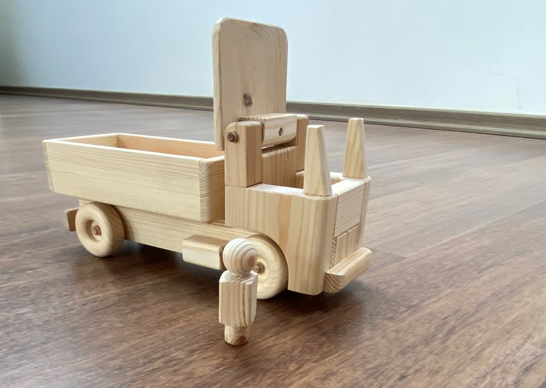 Hila, the wooden straight toy truck with a peg man driver low walls image 1