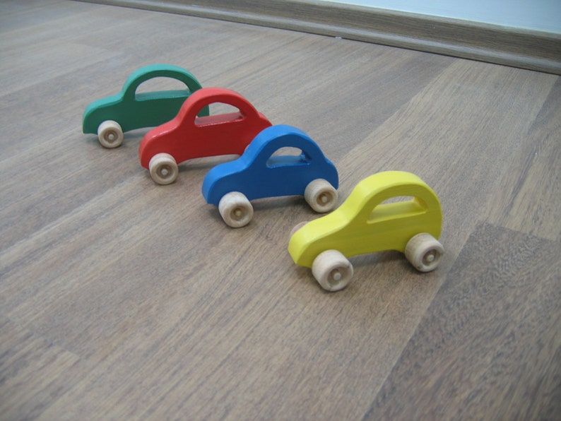 Wooden toy cars set of four blue, green, red, yellow image 1