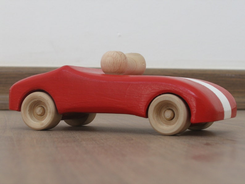 Handcrafted wooden toy red car with white stripe pretend play car toy with two peg people image 3