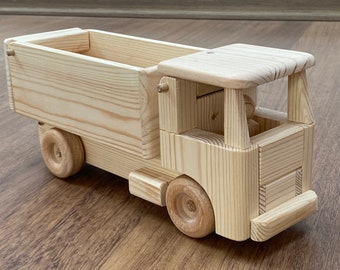 Eitan, the wooden toy straight dump truck with a peg man driver