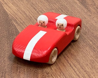 Illy, a handcrafted wooden red toy car