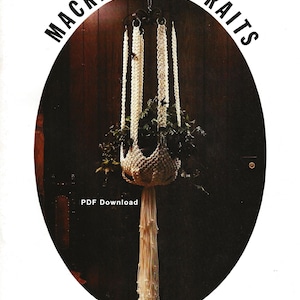 May include: A white macrame plant hanger with a wooden bead at the top and a plant in the pot. The hanger is hanging from a hook on a wooden door. The text "Macrame Portraits Class of 78" is printed on the image.