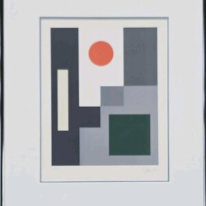 May include: Abstract geometric art print featuring a composition of shapes and colors. The artwork includes a red circle, a green square, and various gray and white rectangular forms. The print is framed in a black frame with a white mat.