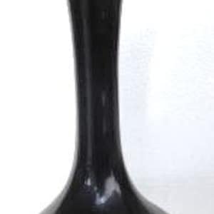 May include: A black ceramic vase with a flared base and a narrow neck. The top of the vase has a light blue glaze.