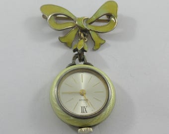 Turler Swiss Gold over Sterling Silver Yellow Enamel Bow Nurse's Lapel Watch Brooch Pin